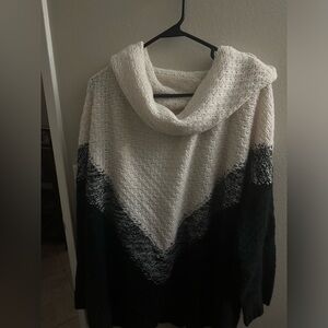 Roaman’s black and white cowl neck sweater